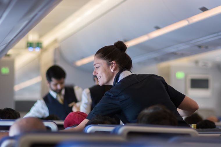 cabin crew serving during flight